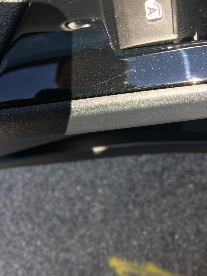 How to get rid scratch glossy black plastic surrounding