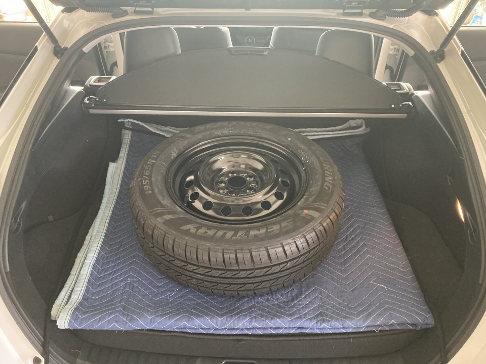 2021 prius prime spare tire in back of priusd.jpg