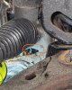 12mm socket dropped and found hiding under steering support.jpg