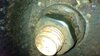 Nut inside metal above.jpg