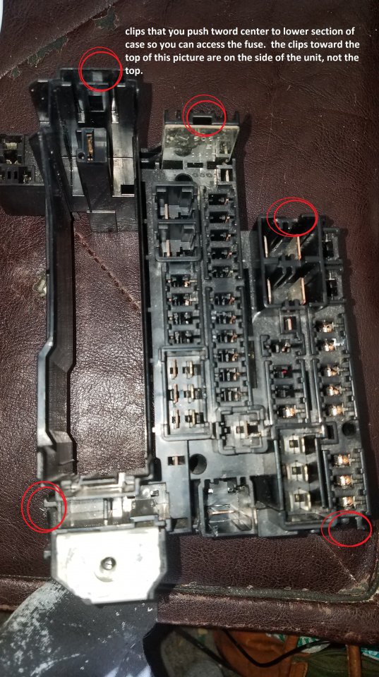 Tabs to separate halves of prius gen3 fuse box.jpeg